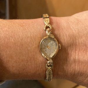 Vintage Bulova gold watch, manual wind, dainty